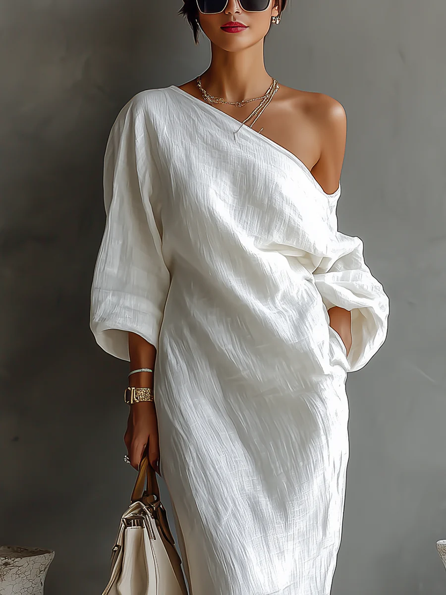 Brynja | Asymmetrisk och elegant maxiklänning