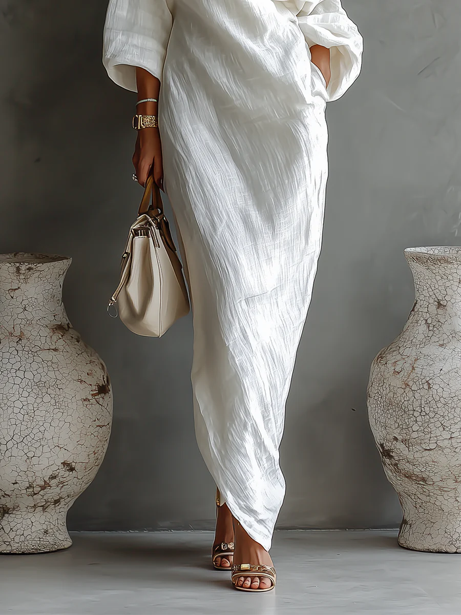 Brynja | Asymmetrisk och elegant maxiklänning