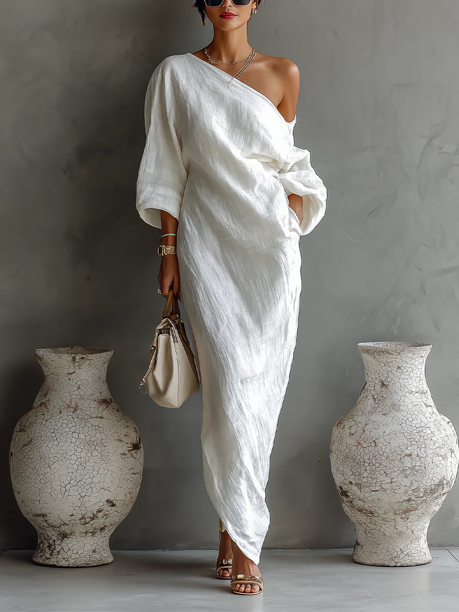 Brynja | Asymmetrisk och elegant maxiklänning
